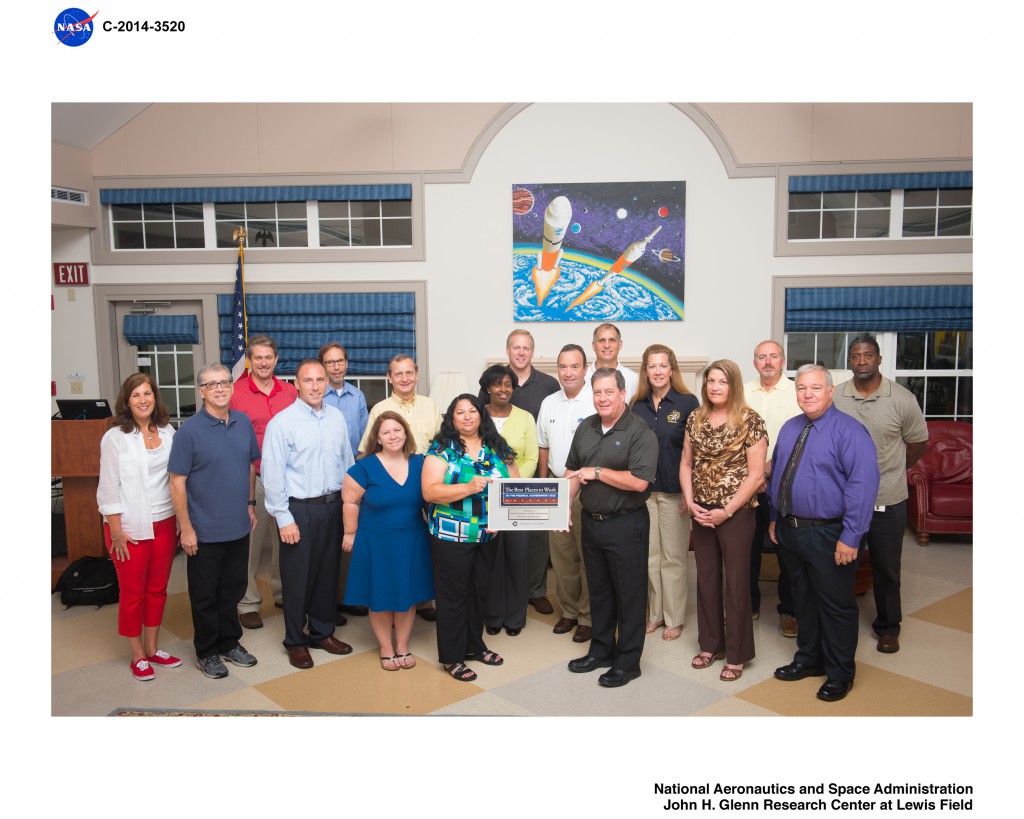 Members of the CIO’s office celebrated NASA’s Best Place to Work achievement during their 2014 CIO Leadership Meeting.  Those present to showcase the plaque included Leigh Anne Girardi, Jim Rinaldi, Larry Freudinger, Sean Gallagher, Dana Mellerio, Lara Petze, Dennis Vandertuig, Dinna Cottrell, Annette Moore, Jeff Seaton, Gary Cox, Larry Sweet, Jonathan Pettus, Deborah Diaz, Vanessa Stromer, Terry Jackson, Jim Walker and Victor Thompson.