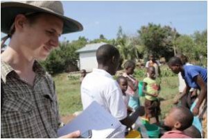 John Feighery helping to check water in Tanzania. (Credit: Annie Feighery)