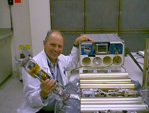 Dr. Morrison with Microencapsulation Electrostatic Processing System (MEPS) flight hardware ready to pack for the International Space Station UF-2 mission. (NASA)