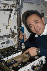 View of Expedition 28 Flight Engineer Satoshi Furukawa with the JAXA Protein Crystal Growth (PCG) investigation aboard the International Space Station Japanese Experiment Module (JEM). (NASA)