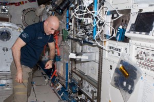 Astronaut Luca Parmitano getting ready to activate specific SSEP mini-labs aboard the International Space Station. The SSEP Falcon I Experiment Payload box is open. (NASA)