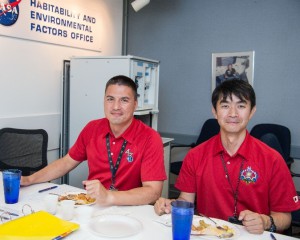 International Space Station Expedition 44/45 crew members Kjell Lindgren and Kimiya Yui enjoying food tasting at NASA’s Habitability and Environmental Factors Office in Houston. Lindgren plans to take his own espresso grounds with him into orbit to enjoy as part of the Capillary Beverage study. (NASA/Bill Stafford)