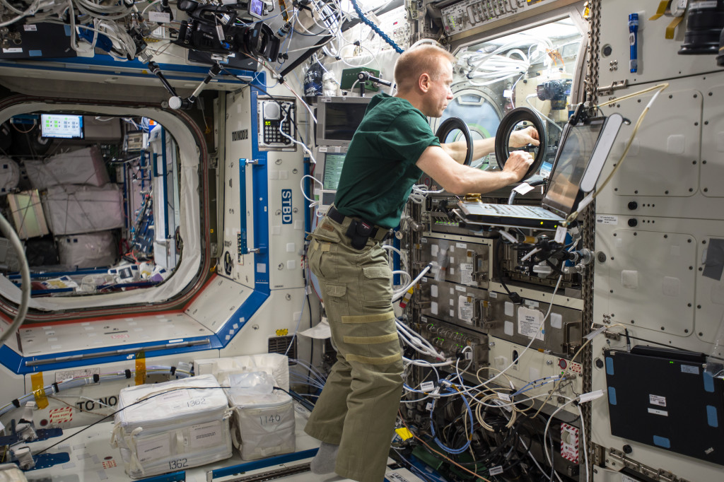 NASA astronaut Tim Kopra performs BASS-M operations in the Microgravity Sciences Glovebox in the Destiny Lab aboard the International Space Station. 