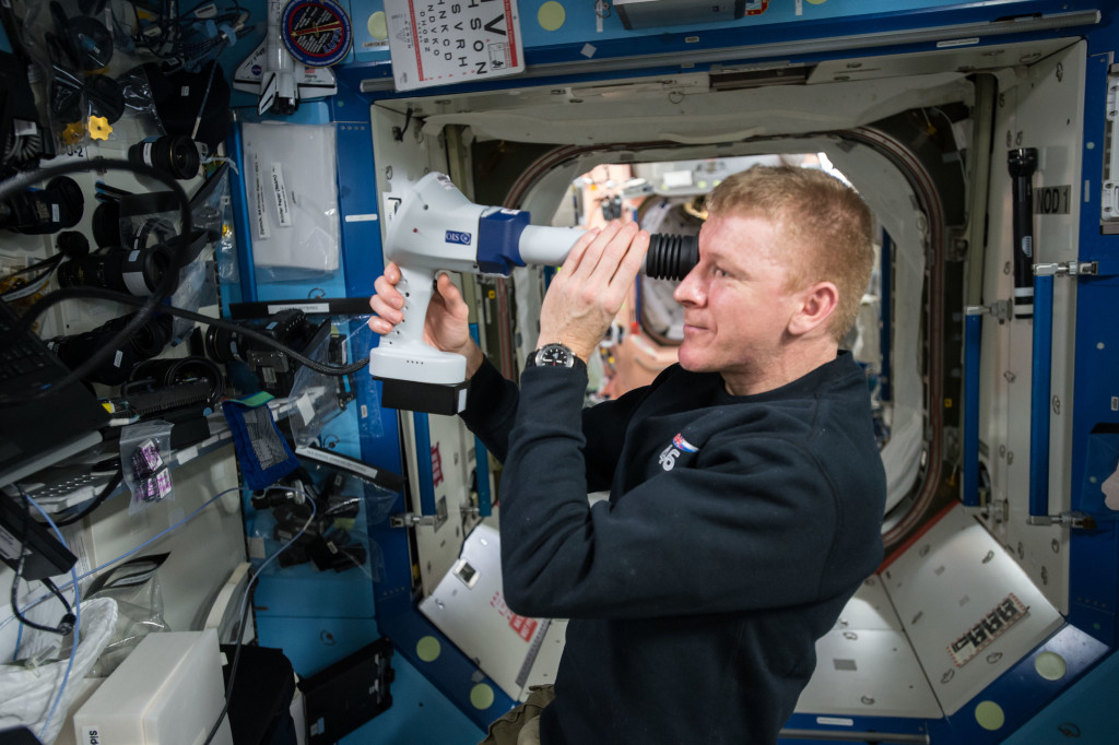 European Space Agency (ESA) Tim Peake, performs Ocular Health fundoscope exam aboard the International Space Station. Credits: NASA