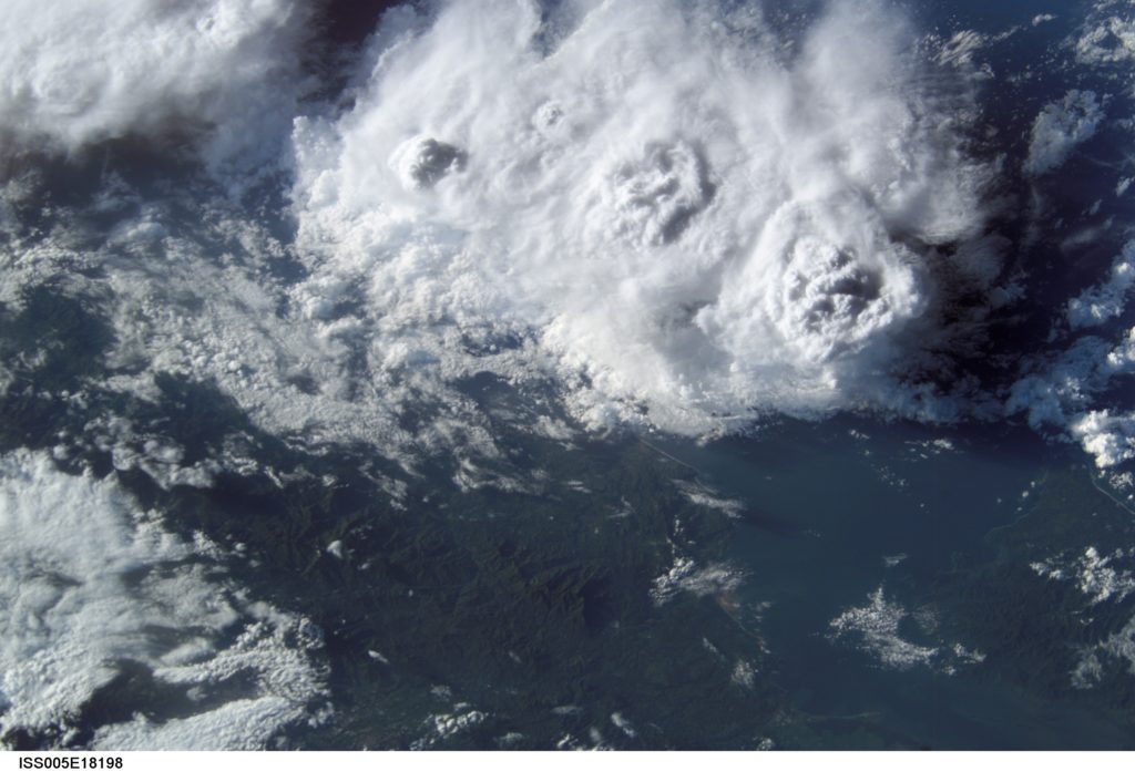 From low earth orbit, astronauts have a unique perspective from which to view weather phenomena such as the cloud tops of thunderstorm cells. Cumulonimbus clouds tops (top half of image) were forming over the Gulf of Nicoya along the Pacific coastline of Costa Rica when the image was taken. This image was captured on Oct. 23, 2002. Credits: NASA