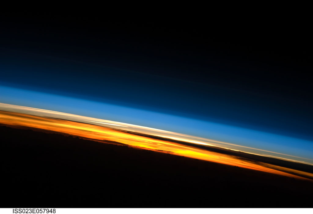 This spectacular image of sunset on the Indian Ocean was taken by astronauts aboard the International Space Station (ISS). The image presents an edge-on, or limb view, of the Earth’s atmosphere as seen from orbit. The Earth’s curvature is visible along the horizon line, or limb, that extends across the image from center left to lower right. This image was captured during Sellers’ last mission to space, aboard STS-132. Credits: NASA