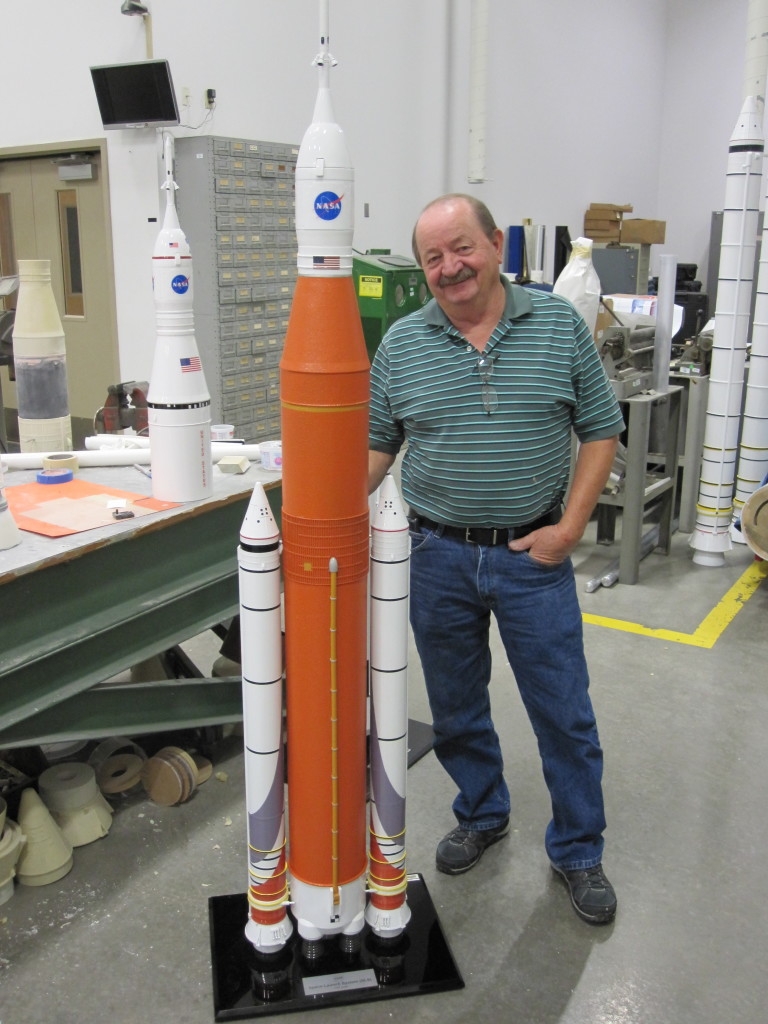 Barry Howell with a freshly updated 1-to-50 scale model of SLS