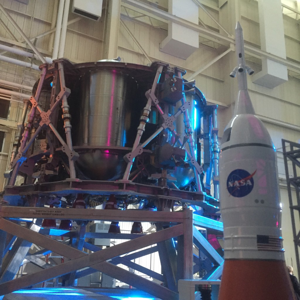 The Orion service module test article with a model of SLS