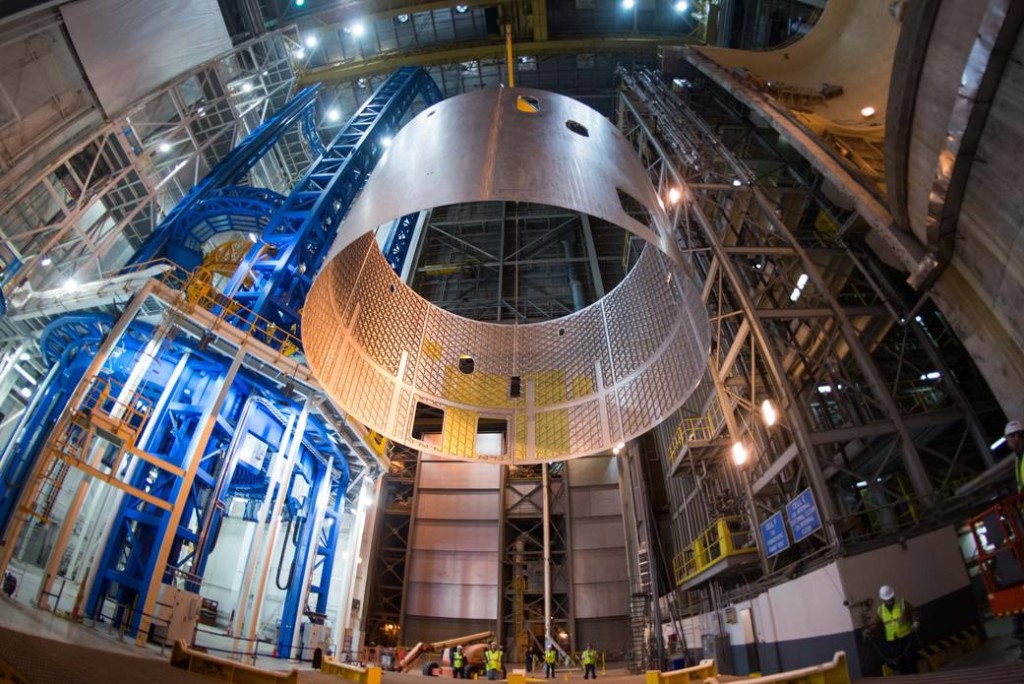 An engine section weld confidence article for the SLS Core Stage is taken off the Vertical Assembly Center at NASA's Michoud Assembly Facility in New Orleans