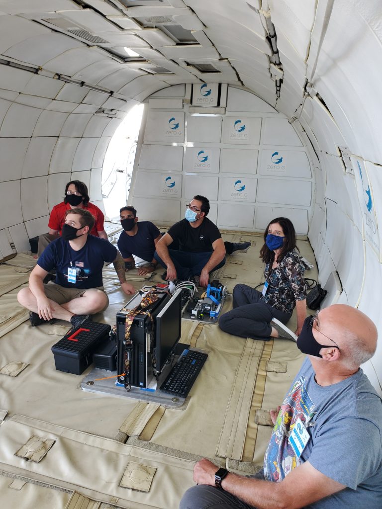 The research team installs their experimental hardware on G Force One