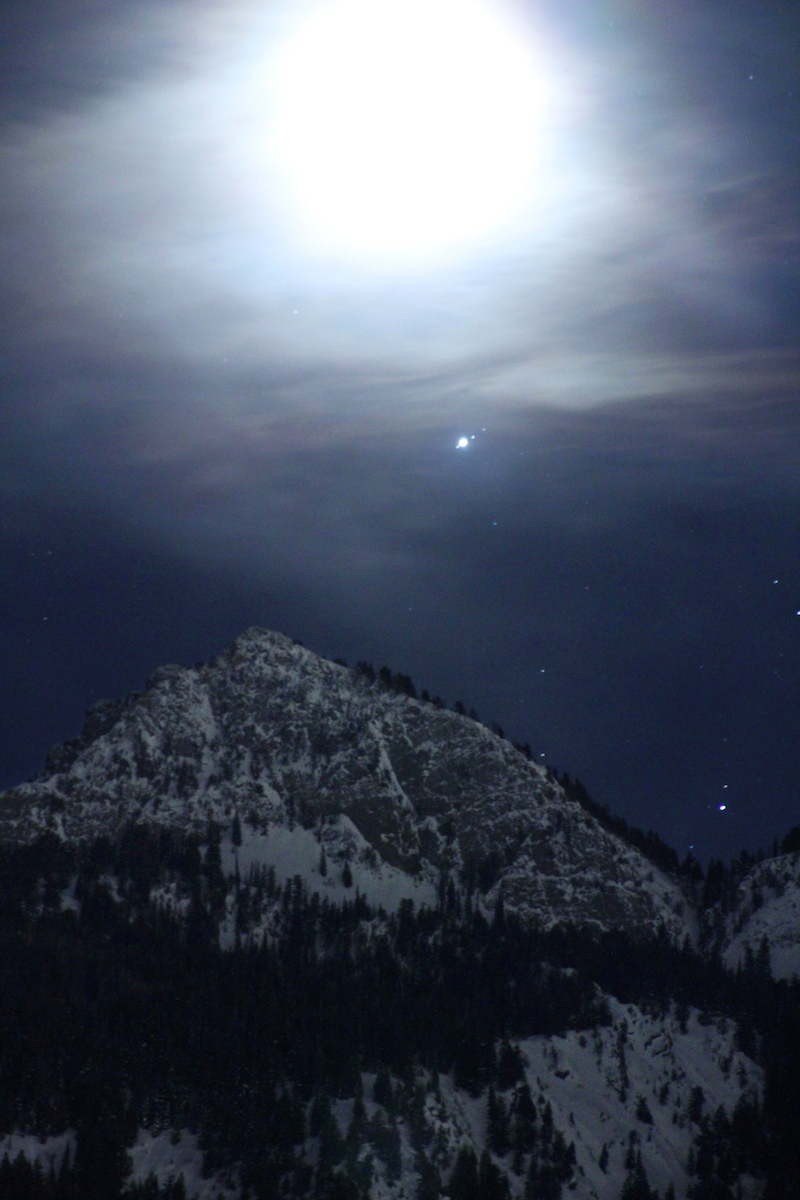 As the Moon rose over the Wasatch Mountains near Salt Lake City on Feb. 27, 2019, the planet Jupiter could be seen, along with three of its largest moons.