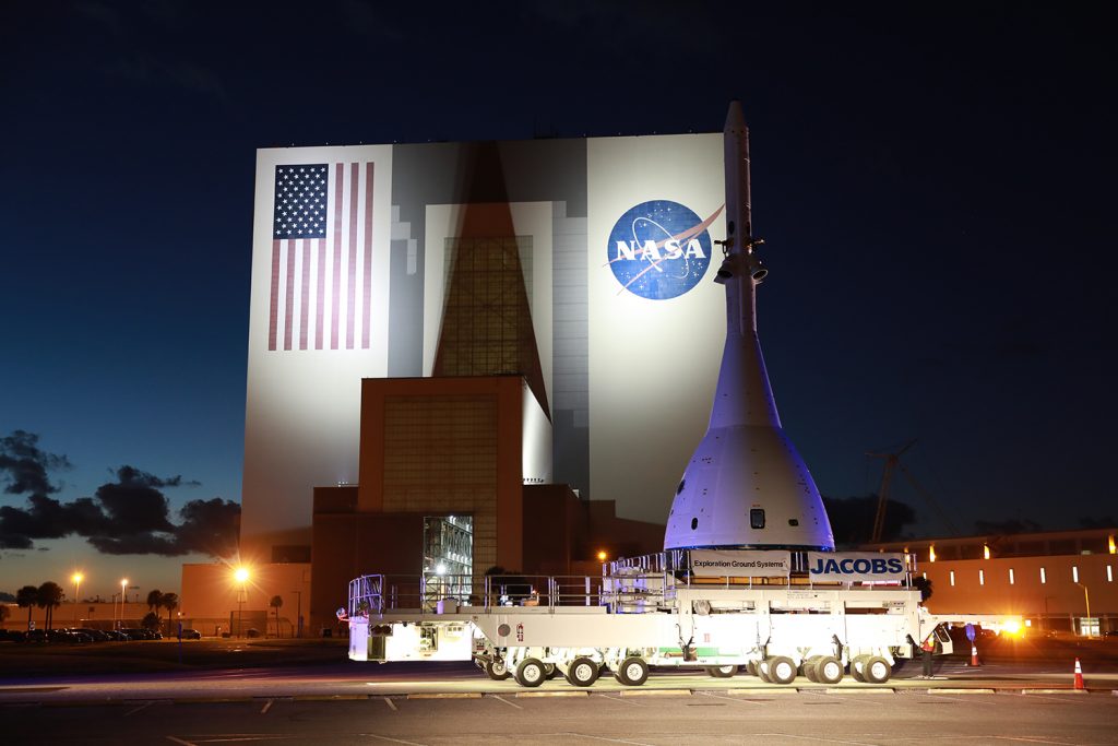 The flight test article for Orion’s Ascent Abort-2 (AA-2) flight test passes by the Vehicle Assembly Building at NASA’s Kennedy Space Center in Florida, on its 21.5-mile-trek to Space Launch Complex 46 at Cape Canaveral Air Force Station on May 22, 2019. 