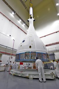 Inside the Launch Abort System Facility (LASF) at NASA’s Kennedy Space Center in Florida, workers are completing the integration of a test version of the Orion crew module with the Launch Abort System (LAS) on May 18, 2019.