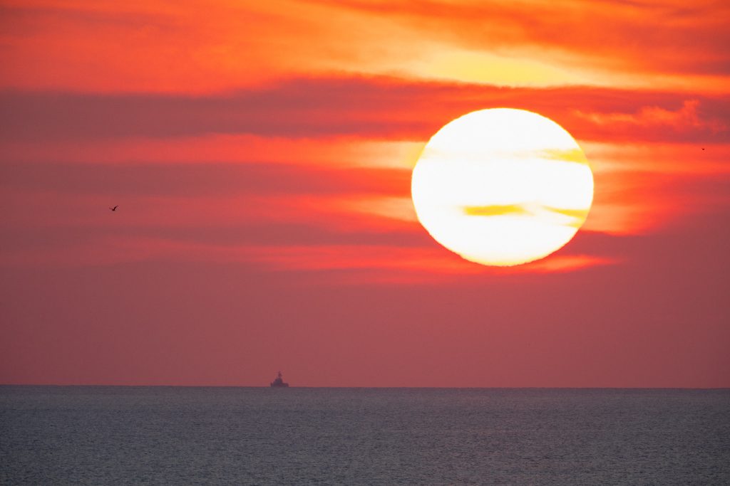 A brilliant sunrise fills the sky before a fully functional Launch Abort System (LAS) with a test version of Orion attached, launches on NASA’s Ascent Abort-2 (AA-2) atop a Northrop Grumman provided booster on July 2, 2019, at 7 a.m. EDT, from Launch Pad 46 at Cape Canaveral Air Force Station in Florida. During AA-2, the booster will send the LAS and Orion to an altitude of 31,000 feet, traveling at Mach 1.15 (more than 1,000 mph). The LAS’ three motors will work together to pull the crew module away from the booster and prepare it for splashdown in the Atlantic Ocean. The flight test will prove that the abort system can pull crew to safety in the unlikely event of an emergency during ascent. 