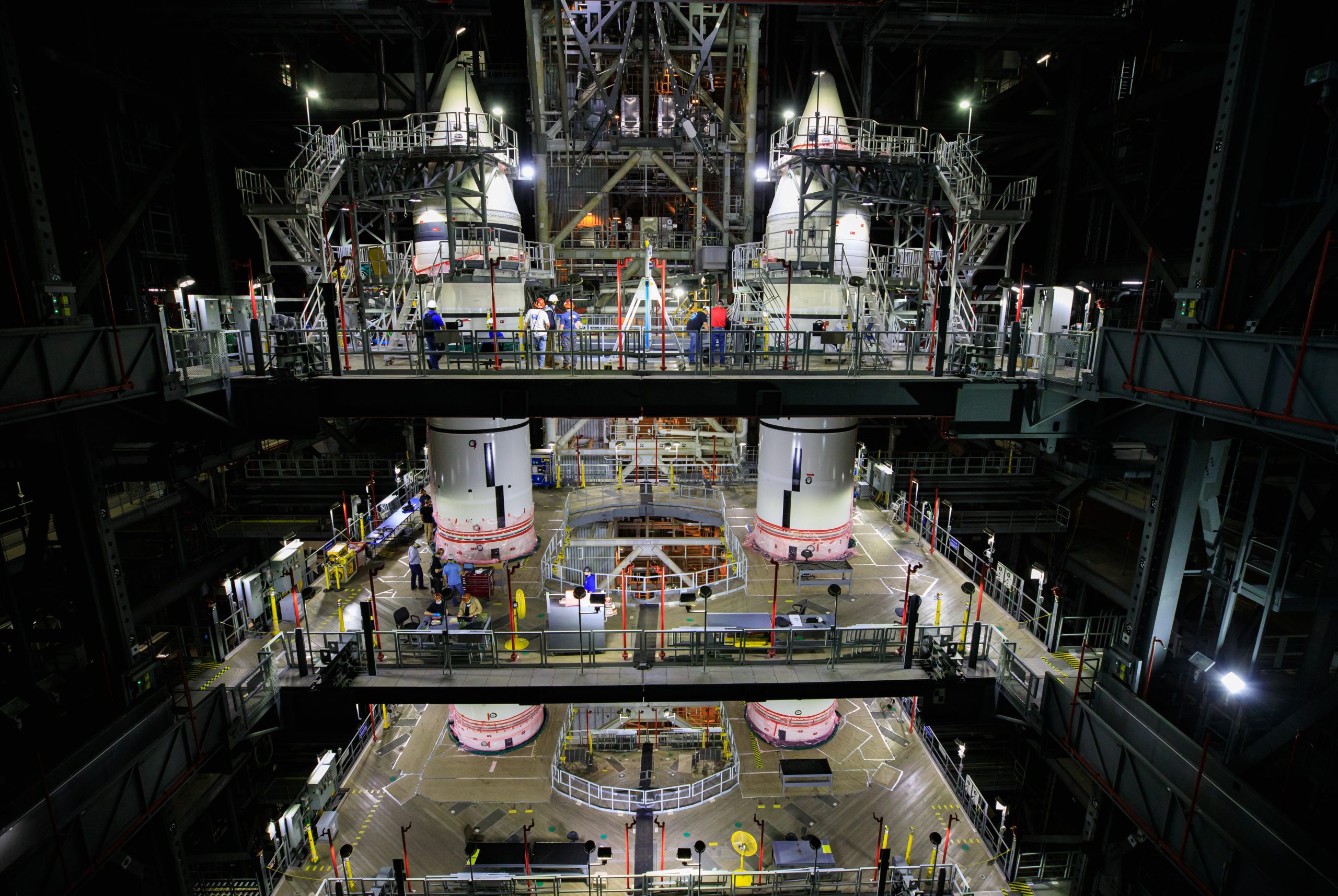 The Space Launch System boosters are stacked on the mobile launcher inside the Vehicle Assembly Building.