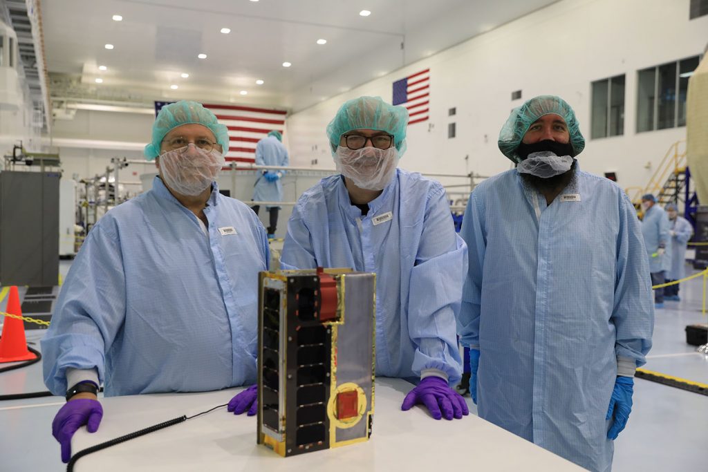 Team CuSP cheers on the solar CubeSat prior to loading it in the Space Launch System rocket Orion stage adapter at NASA’s Kennedy Space Center in Florida. 