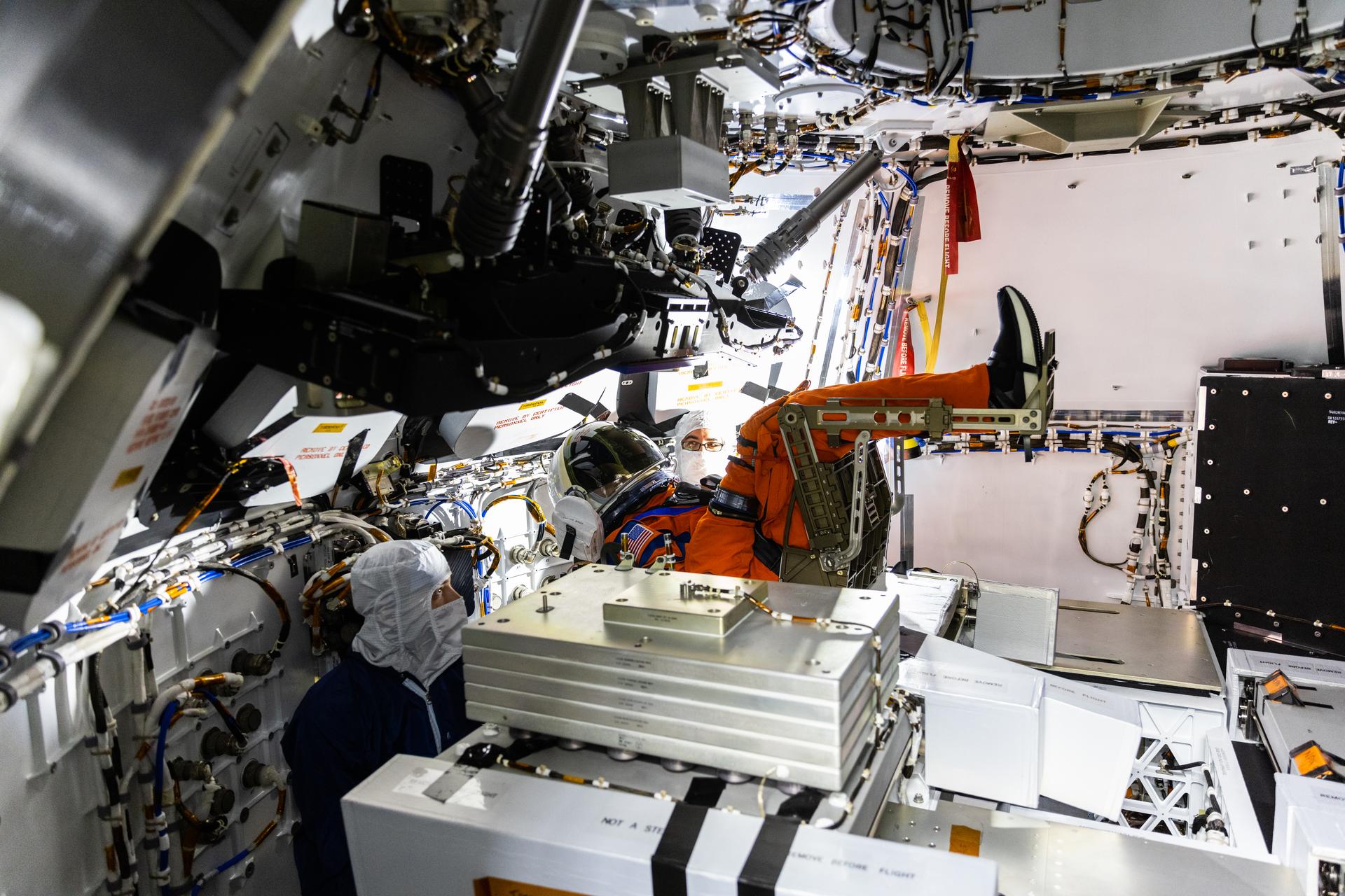 A view of Moonikin “Campos” secured in a seat inside the Artemis I Orion crew module atop the Space Launch System rocket in High Bay 3 of the Vehicle Assembly Building at NASA’s Kennedy Space Center in Florida on Aug. 3, 2022. 