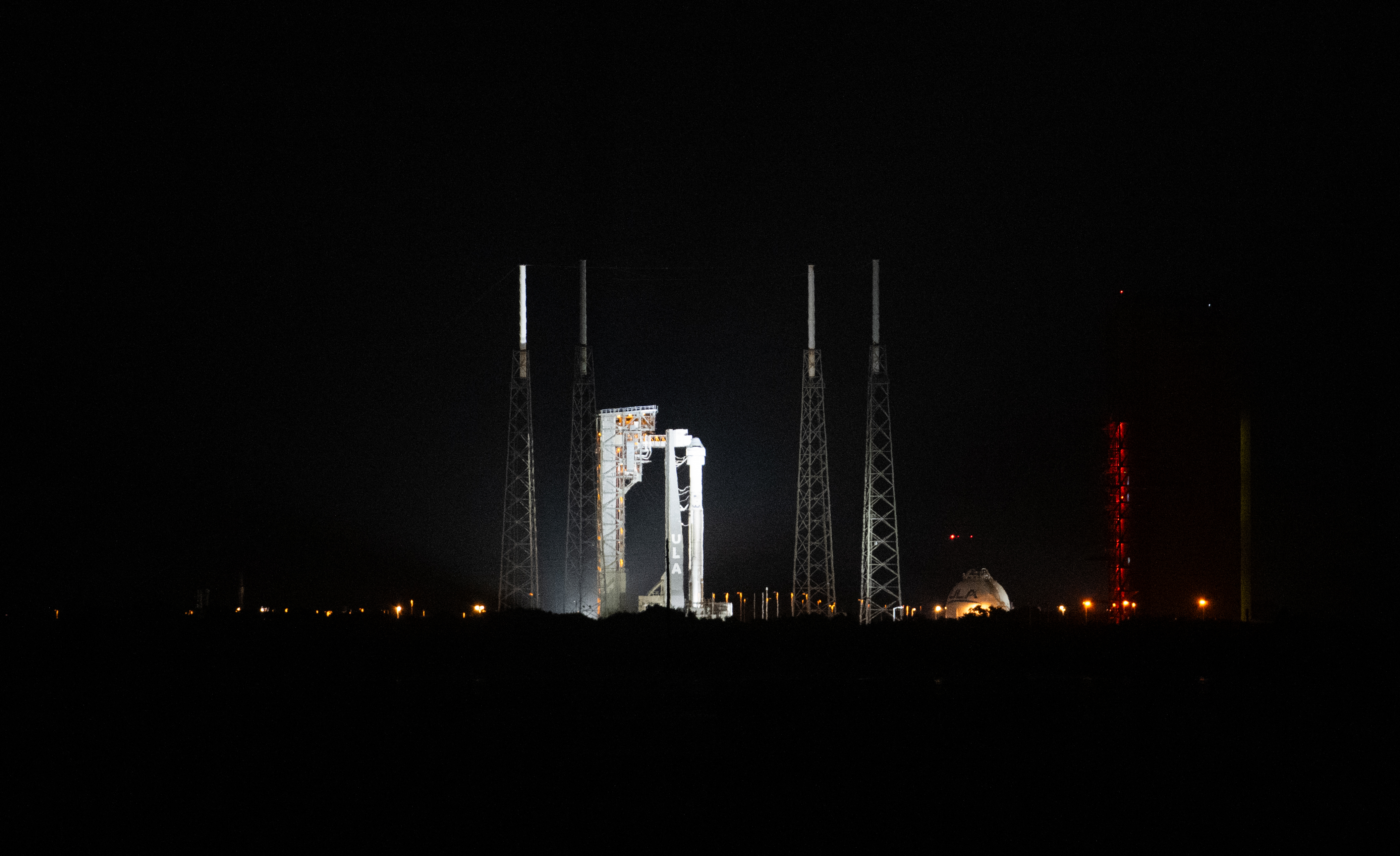 A United Launch Alliance Atlas V rocket with Boeing’s Starliner spacecraft aboard is seen illuminated by spotlights on the launch pad at Space Launch Complex-41 ahead of the NASA’s Boeing Crew Flight Test, Wednesday, June 5, 2024 at Cape Canaveral Space Force Station in Florida. 