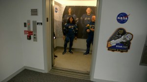 After suit-up and final fit checks, NASA’s Boeing Crew Flight Test astronauts Suni Williams and Butch Wilmore enter the elevator in the Astronaut Crew Quarters on Wednesday, June 5, 2024, inside Kennedy Space Center’s Neil A. Armstrong Operations and Checkout Building in Florida. 