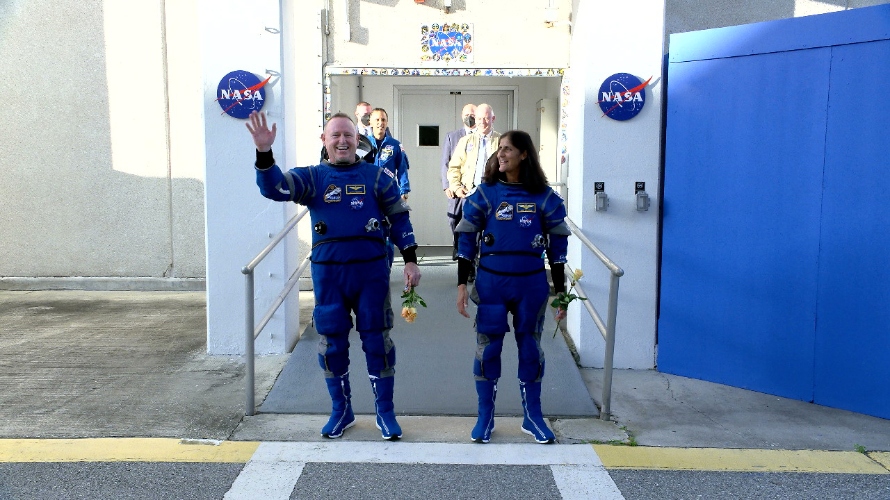 image of NASA’s Boeing Crew Flight Test astronauts Butch Wilmore and Suni Williams walk out of the Neil A. Armstrong Operations and Checkout Building on Wednesday, June 5, 2024, at the agency’s Kennedy Space Center in Florida. 