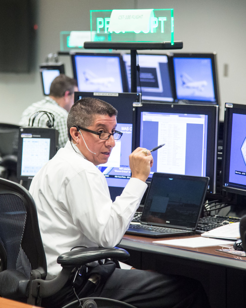 Commerical Crew Program astronauts Bob Behnken and Eric Boe perfoming and on-console simulation of Boeing's CST-100 Starliner at Johnson Space Center (JSC)