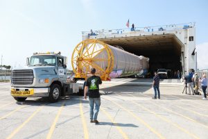 The United Launch Alliance (ULA) Atlas V booster that will be used for Boeing’s Crew Flight Test (CFT) is moved out of the Mariner cargo ship at the Army Wharf at Cape Canaveral Air Force Station in Florida on June 5, 2019. 