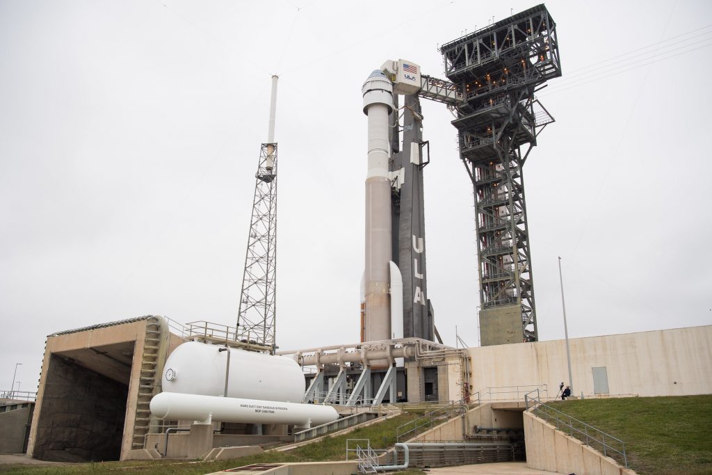 The crew access arm is seen after being moved into position for Boeing's CST-100 Starliner spacecraft atop a United Launch Alliance Atlas V rocket on the launch pad at Space Launch Complex 41 ahead of the Orbital Flight Test mission, Wednesday, Dec. 18, 2019 at Cape Canaveral Air Force Station in Florida.