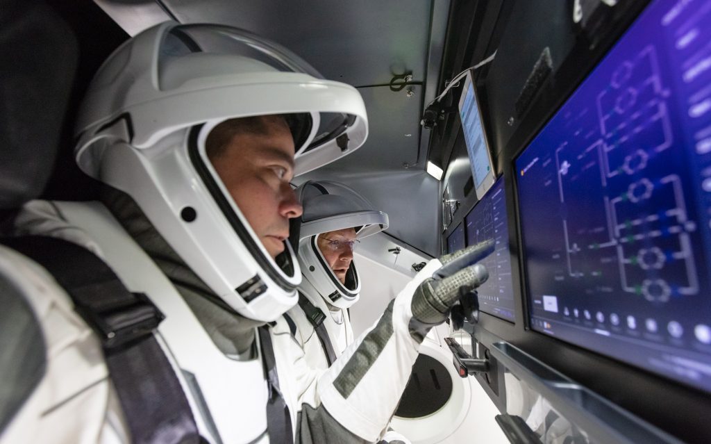 NASA astronauts Doug Hurley and Bob Behnken familiarize themselves with SpaceX’s Crew Dragon, the spacecraft that will transport them to the International Space Station as part of NASA’s Commercial Crew Program.