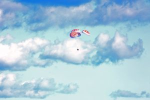 SpaceX’s Crew Dragon is guided by four parachutes toward the Atlantic Ocean on March 8, 2019, after returning from the International Space Station on NASA's SpaceX Demo-1 mission.