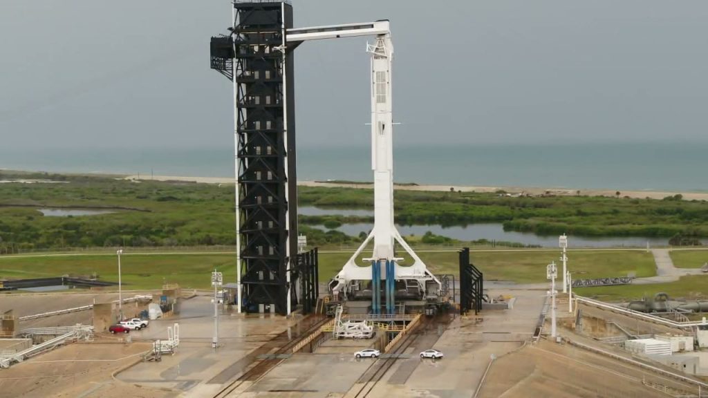 NASA's SpaceX Demo-2 crew arrives at the base of the SpaceX Falcon 9 rocket at Kennedy's Launch Complex 39A. 