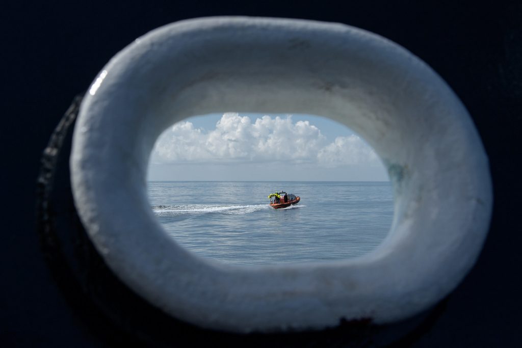 SpaceX support teams are deployed on fast boats from the SpaceX GO Navigator recovery ship ahead of the landing of the SpaceX Crew Dragon Endeavour spacecraft with NASA astronauts Robert Behnken and Douglas Hurley onboard, Sunday, Aug. 2, 2020 in the Gulf of Mexico off the cost of Pensacola, Florida.