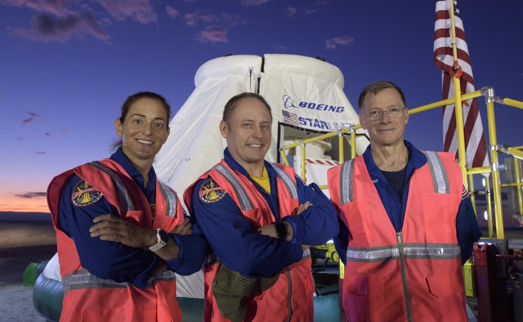 NASA astronauts Nicole Mann, left, Mike Fincke, and Boeing astronaut Chris Ferguson, right