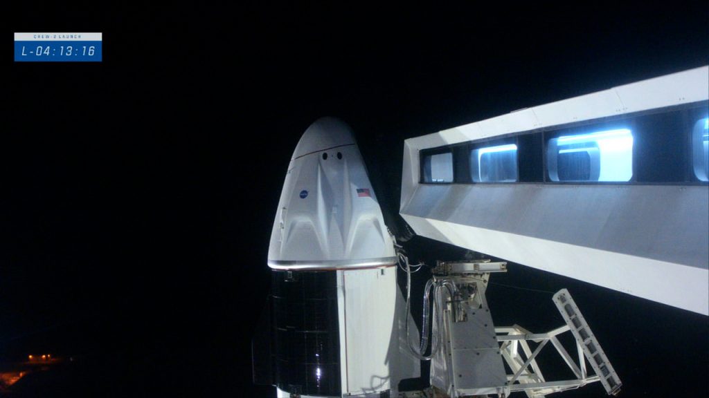 Close-up view of Crew Dragon and the Crew Access Arm.