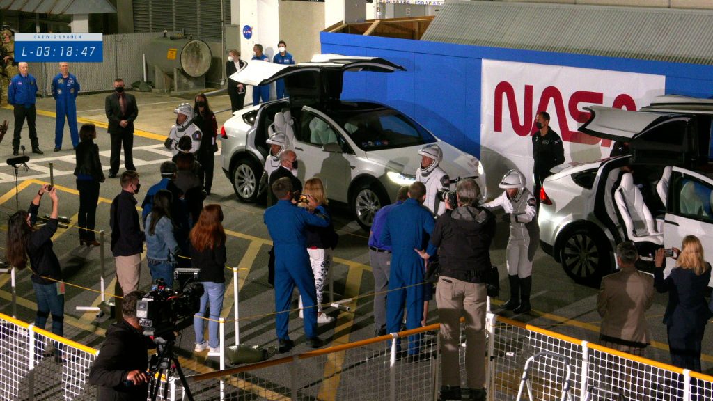 Crew-2 astronauts visit with family and friends before boarding their Tesla X vehicles for the trip to Launch Complex 39A at NASA's Kennedy Space Center in Florida on April 23, 2021.