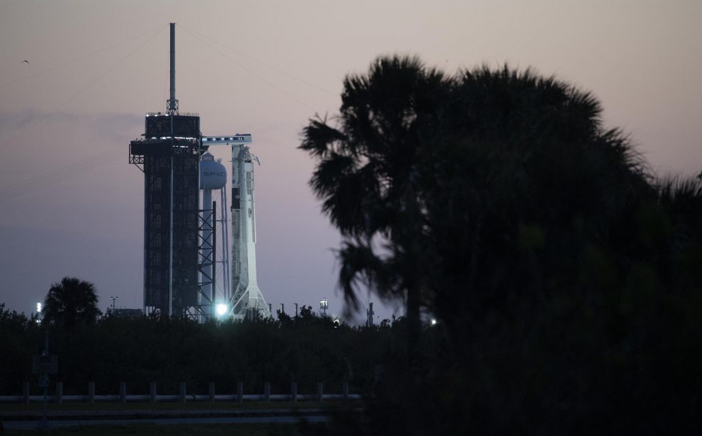 A SpaceX Falcon 9 rocket with the company's Crew Dragon spacecraft onboard is seen at sunrise on the launch pad at Launch Complex 39A as preparations continue for the Crew-2 mission, Thursday, April 22, 2021, at NASA’s Kennedy Space Center in Florida.