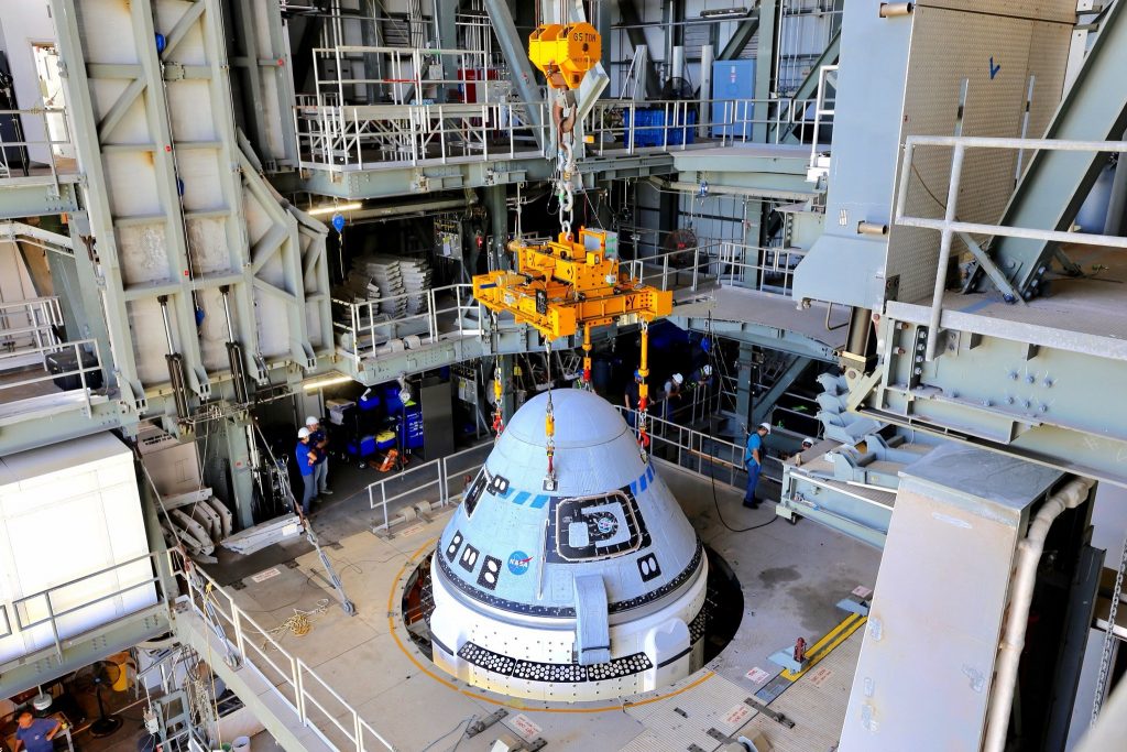 Boeing’s CST-100 Starliner spacecraft is secured atop a United Launch Alliance Atlas V rocket at the Vertical Integration Facility at Space Launch Complex-41 at Florida’s Cape Canaveral Space Force Station on July 17, 2021. Starliner will launch on the Atlas V for Boeing’s second Orbital Flight Test (OFT-2) for NASA’s Commercial Crew Program. The spacecraft rolled out from Boeing’s Commercial Crew and Cargo Processing Facility at NASA’s Kennedy Space Center earlier in the day.