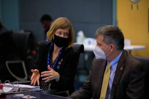 Kathy Lueders, associate administrator, Human Exploration and Operations Mission Directorate, NASA Headquarters, left, talks with Steve Stich, manager, Commercial Crew Program, Kennedy Space Center, during NASA’s SpaceX Crew-2 Flight Readiness Review at Kennedy Space Center on April 15, 2021.