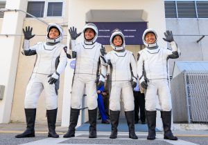 NASA's SpaceX Crew-5 crew members wave at Kennedy Space Center