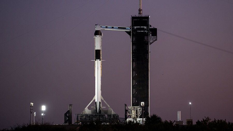 The SpaceX Dragon Endurance crew ship atop the Falcon 9 rocket stands at the launch at the Kennedy Space Center in Florida. Credit: NASA/Joel Kowsky