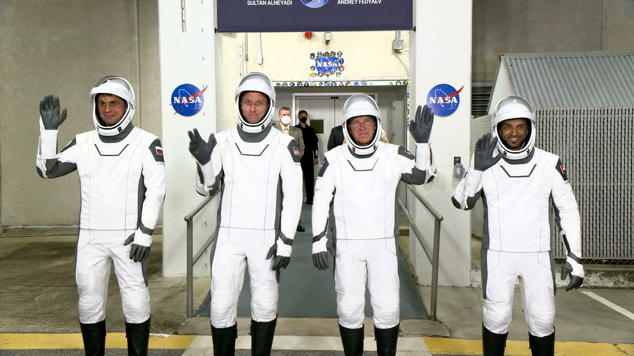 NASA's SpaceX Crew-6 crew members wave to family and friends at Kennedy Space Center in Florida