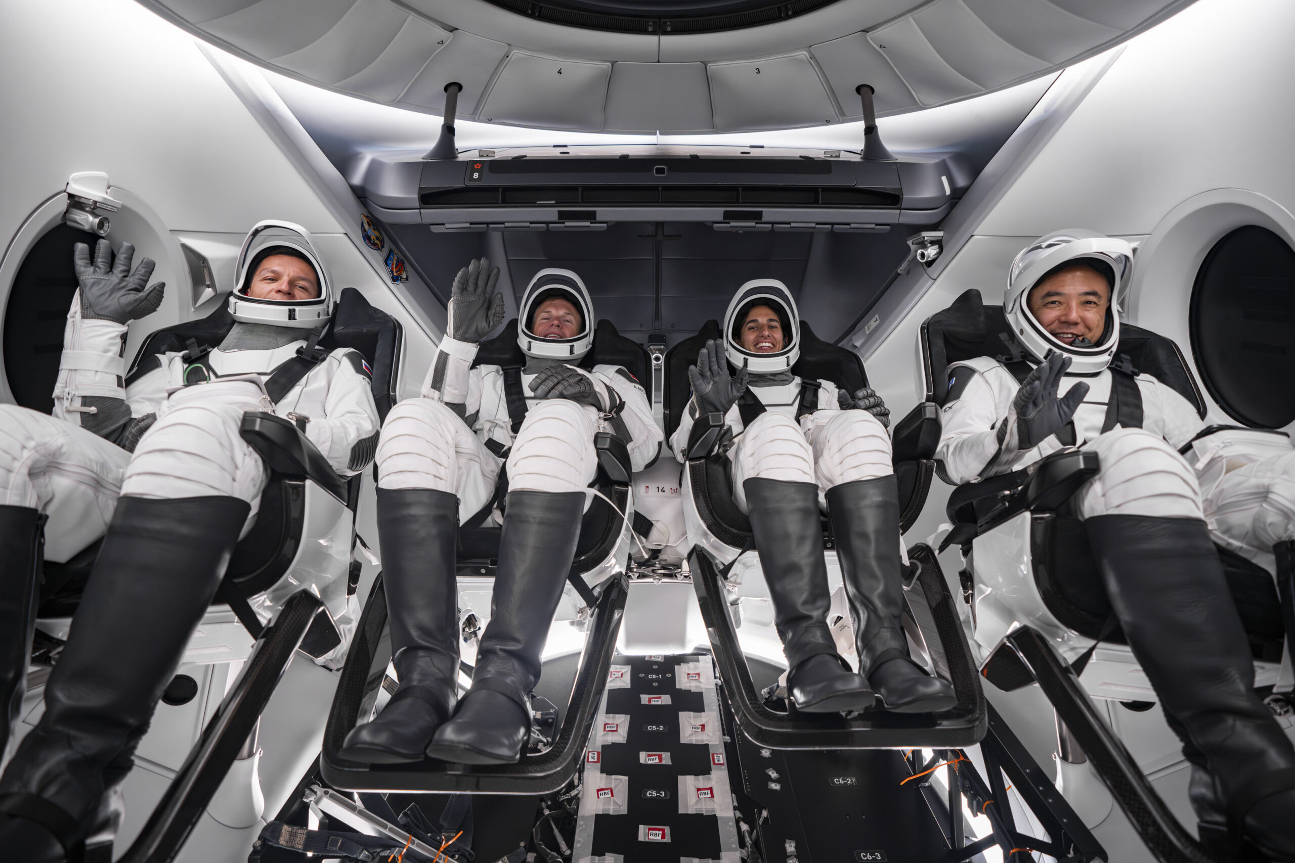 NASA's SpaceX Crew-7 crew members are photographed inside the Dragon spacecraft during a dry dress rehearsal on Aug. 22, 2023.