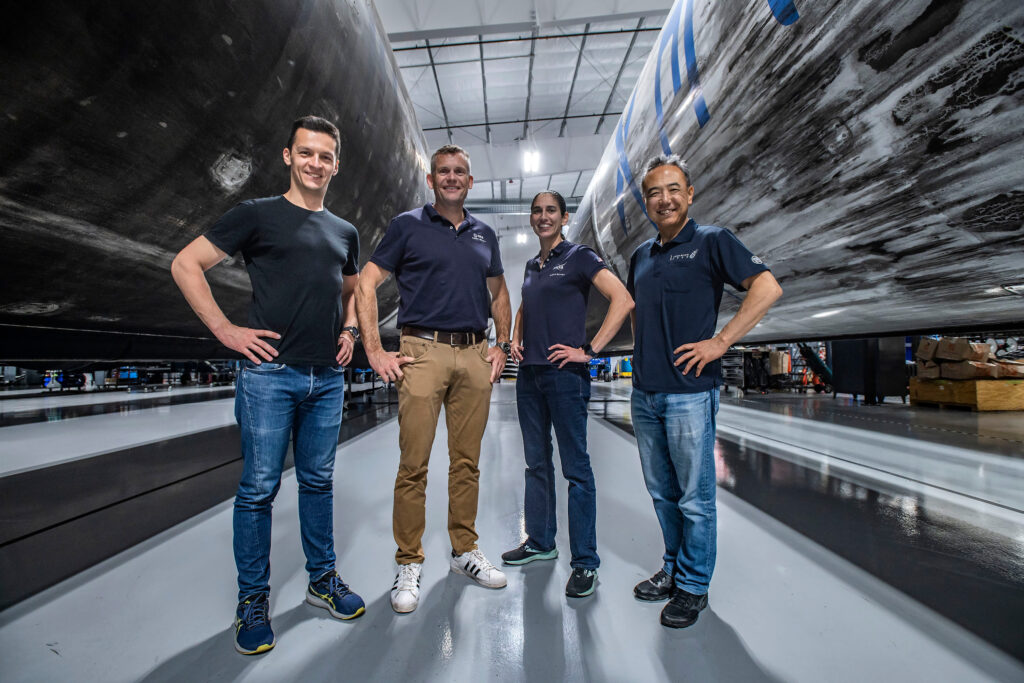 The four crew members of NASA's SpaceX Crew-7 mission pose for a photo inside SpaceX Hangar X at NASA's Kennedy Space Center in Florida.