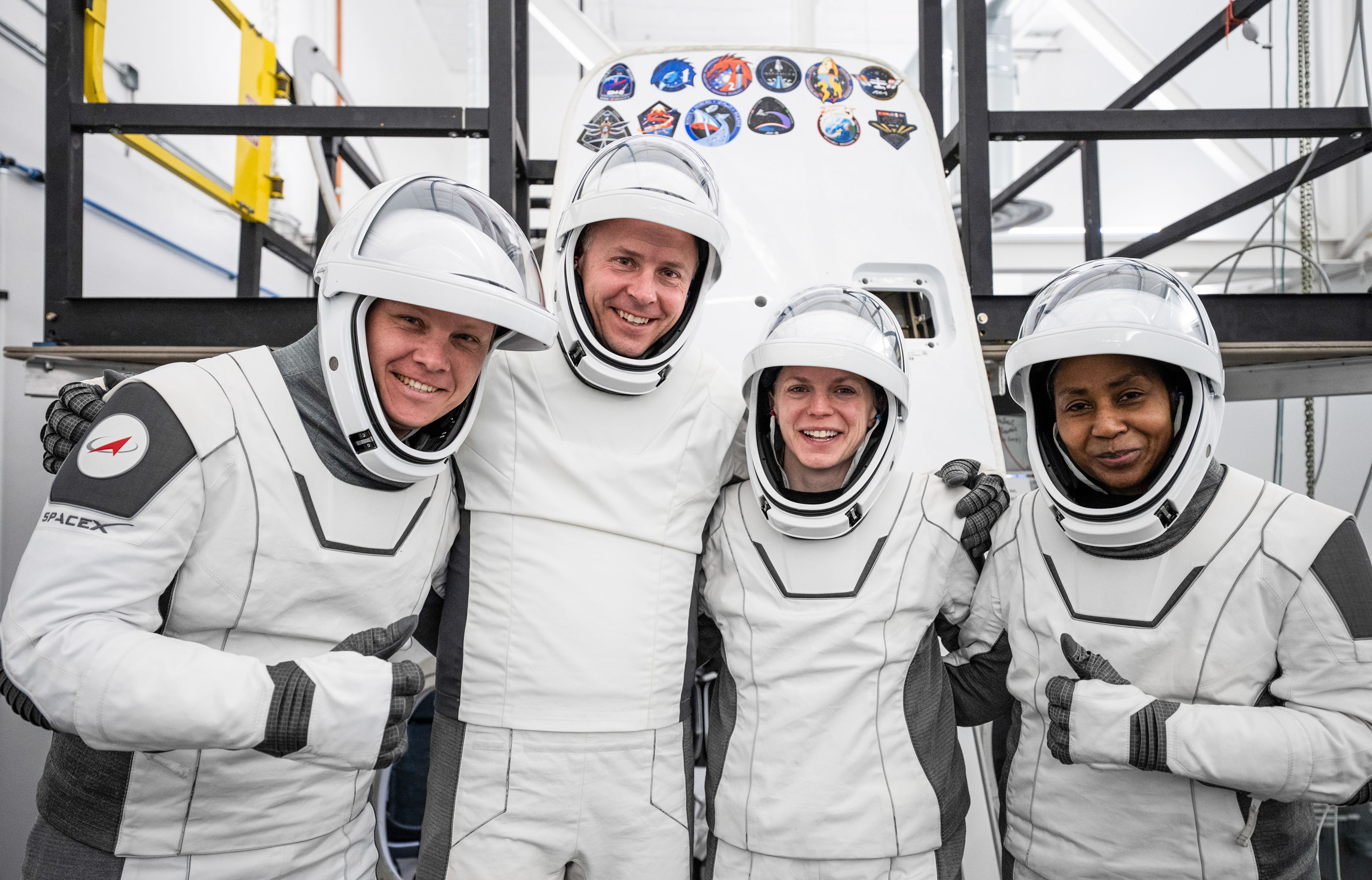 Image shows NASA SpaceX Crew-9 astronauts. From right, Stephanie Wilson, mission specialist; Zena Cardman, commander; Nick Hague, pilot; and Roscosmos cosmonaut Alexander Gorbunov, mission specialist,.