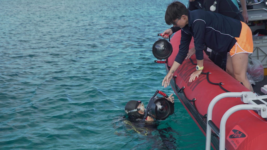 Scientists at work near a reef