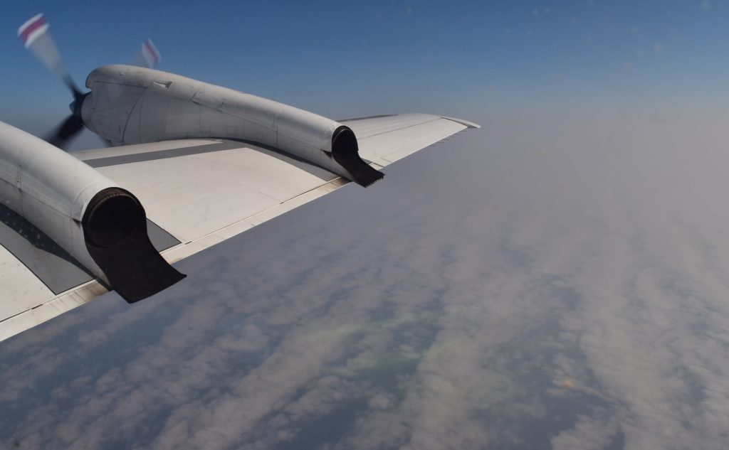 NASA’s P-3 flies above clouds over the southeast Atlantic ocean to study their interactions with smoke. Credit: NASA/Jane Peterson