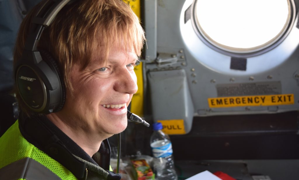 Sebastian Schmidt of the University of Colorado Boulder is the flight scientist on Sept. 2 keeping track of all activities aboard the P-3. Credit: NASA/Jane Peterson