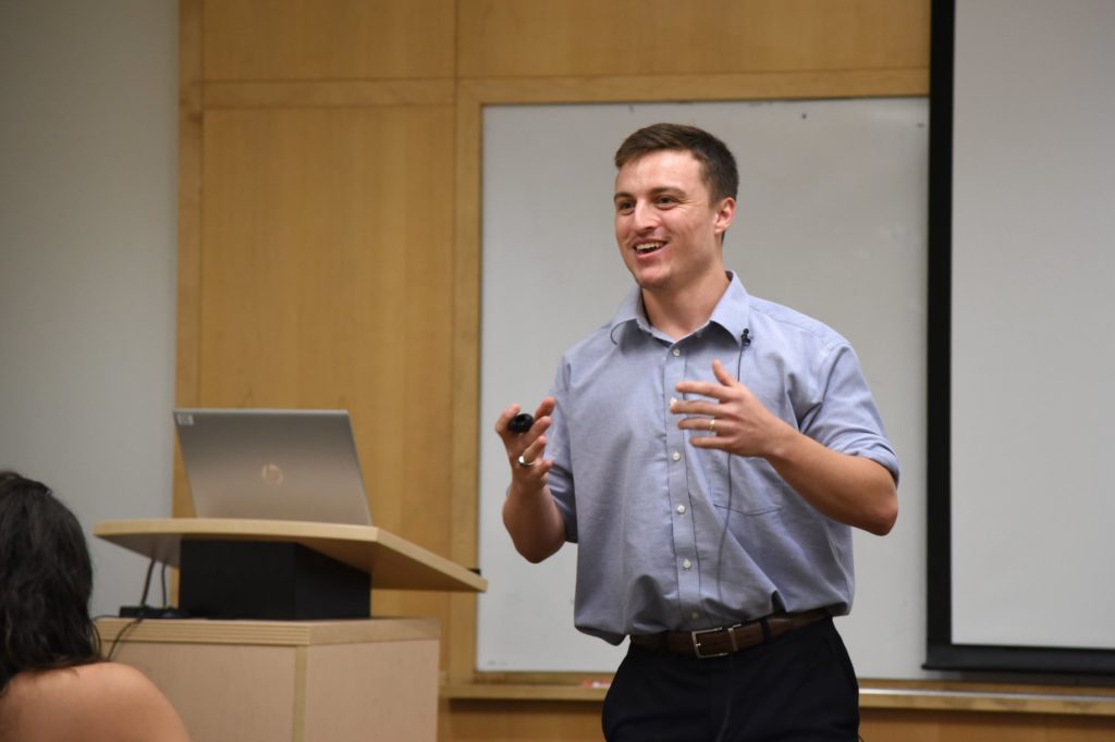 Corey Walker presents his research findings to the Student Airborne Research Program group. Credits: NASA / Megan Schill