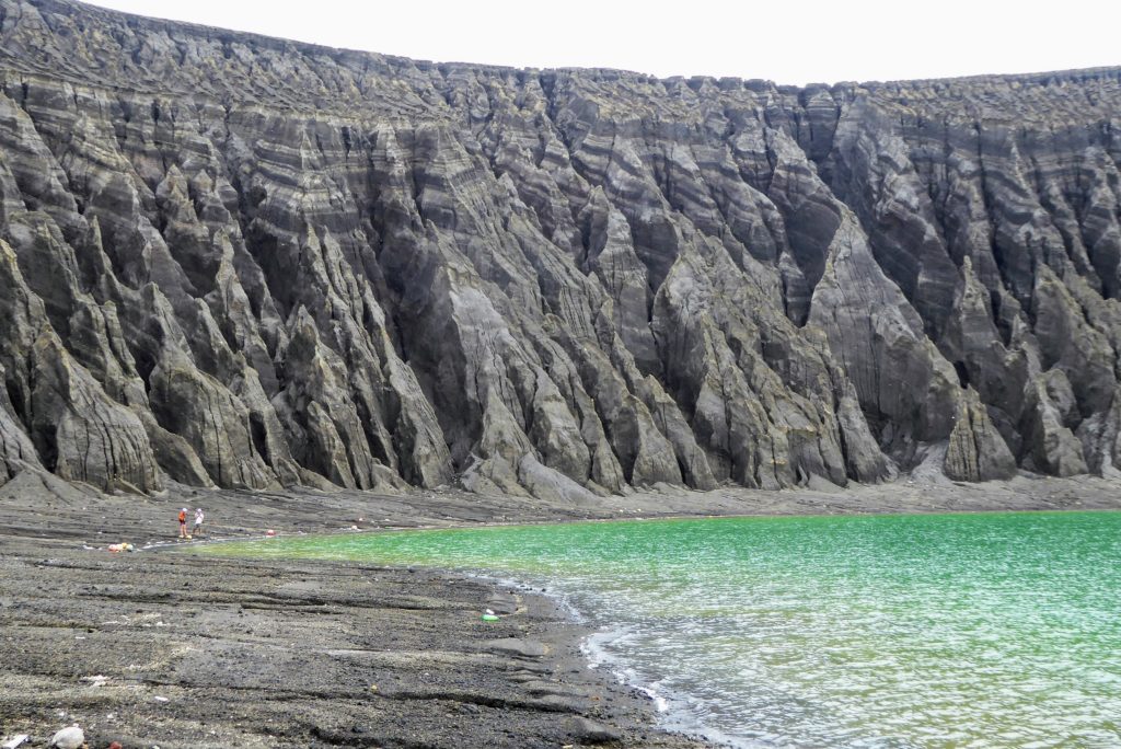 The cliffs of the crater lake are etched with erosion gullies. Credit: Dan Slayback