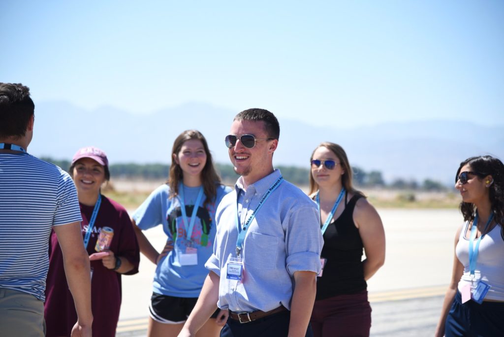 Corey interacts with fellow SARP interns on the flightline at NASA’s Armstrong Flight Researcher Center’s facility in Palmdale, California. Credits: NASA / Megan Schill