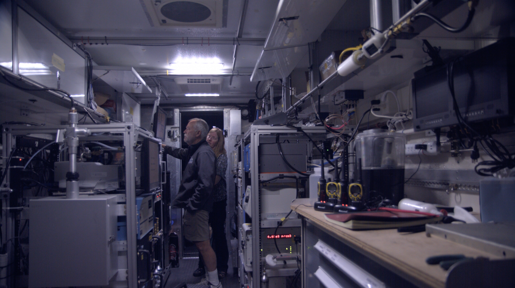 Bruce and Carolyn look at initial readings of gases inside the van. July 24, 2019. Credit: NASA